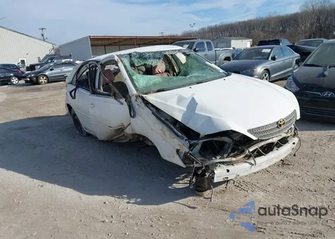 2003 Toyota Camry Le z USA, uszkodzony, nr VIN JTDBE32K930195126